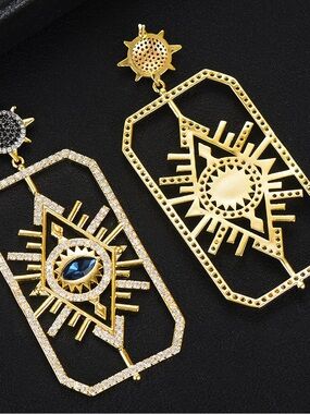 Swarovski Gold-Tone Sunburst Drop Earrings with Blue Center Stones